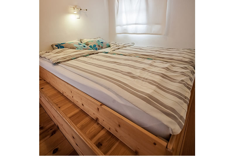 double bed with 180 x 200 cm in the bedroom