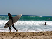 Surfer at Arrifana beach